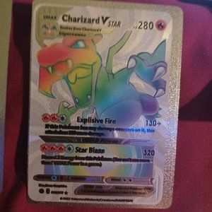 Rare gold pokemon cards 3 rainbow holographic 2 charzRd and 1 pikachu